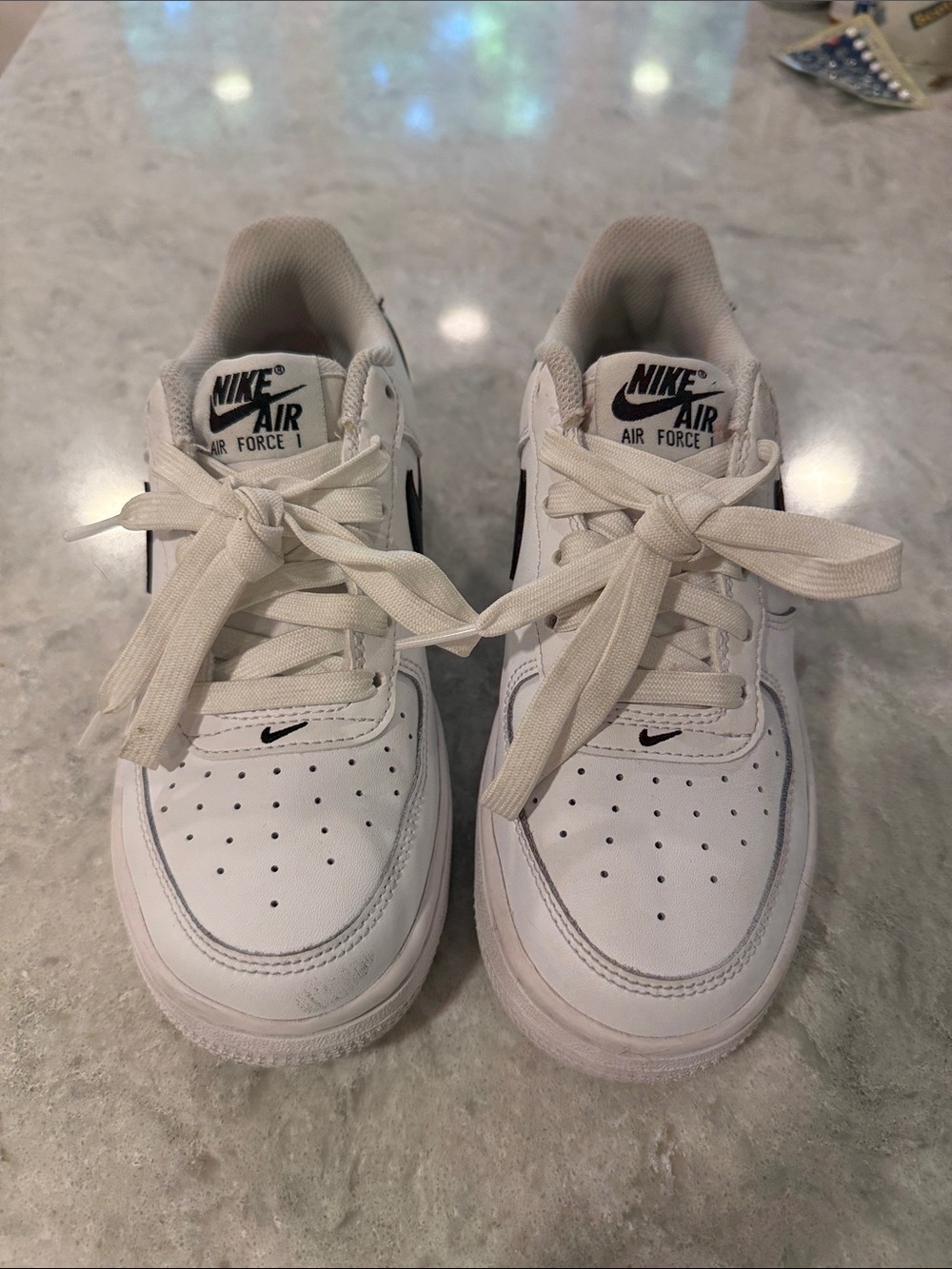 Nike Kids White Air Force 1 Sneakers with Black Swoosh Accent